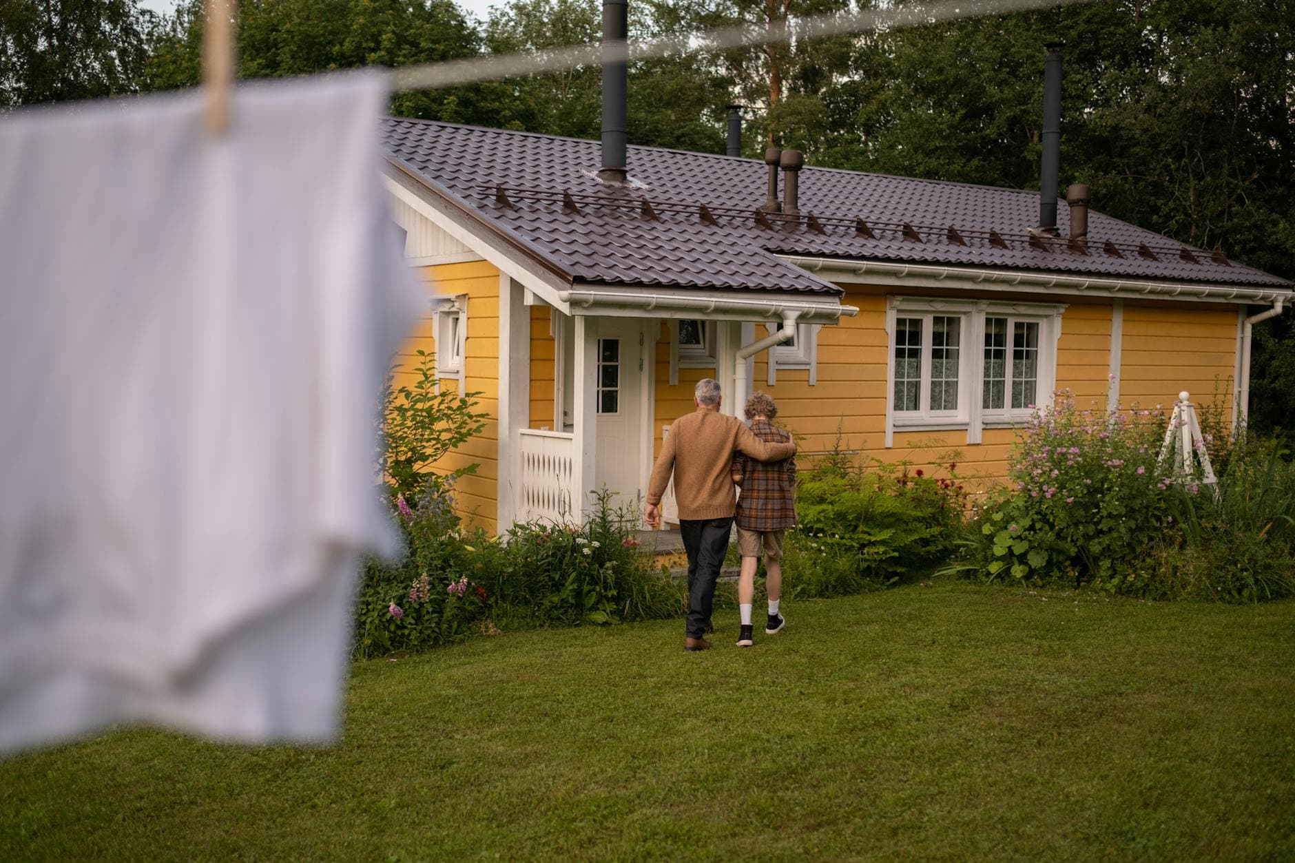Whole-home standby generator beside a residential home